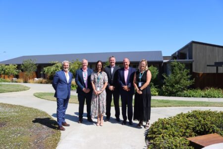 Nic Foster, NBS Community Engagement Manager; Tony Gray, Nelson Tasman Hospice Chief Executive; Dr Jodie Battley, Nelson Tasman Hospice Medical Director; Tony Cadigan, NBS Chief Executive; Paul Bell, NBS Chairman; Donna Ching-Tregidga, Nelson Tasman Hospice Head Of Supporter Engagement & Income Development Outside The Specialist Palliative Care Unit At Nelson Tasman Hospice