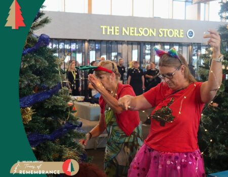 Nelson Pine Industries Ltd decorate their sponsored tree at the Nelson Airport Trees of Remembrance 2025