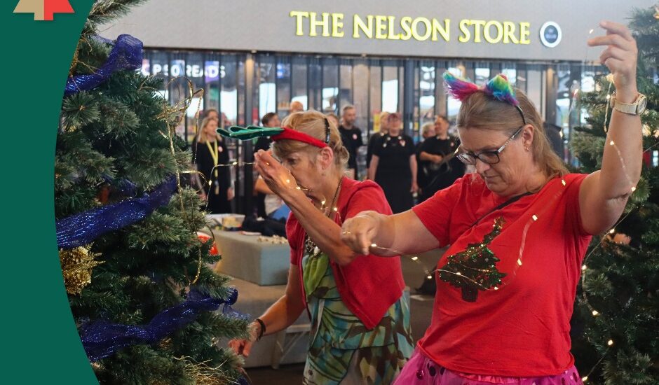 Nelson Pine Industries Ltd decorate their sponsored tree at the Nelson Airport Trees of Remembrance 2025