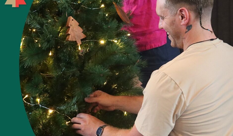 Scope Group Ltd decorate their sponsored tree at the Nelson Airport Trees of Remembrance 2025
