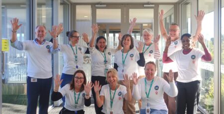 Nelson Tasman Hospice Team Photo - Hands Up for Hospice